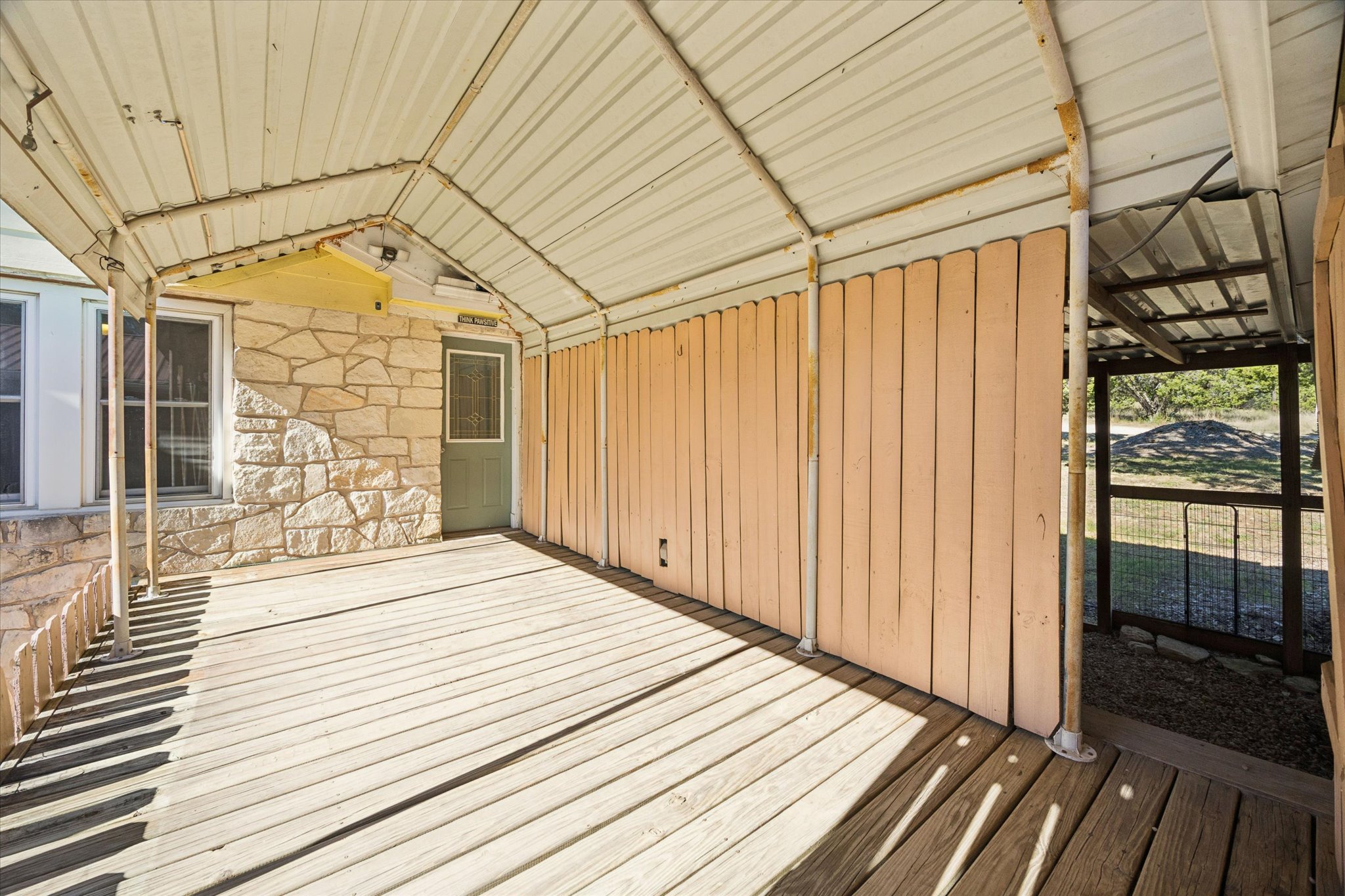 1091 Alta Vista Road Spicewood, TX 78669 - Photo 9 of 28 a space view of a wooden floor