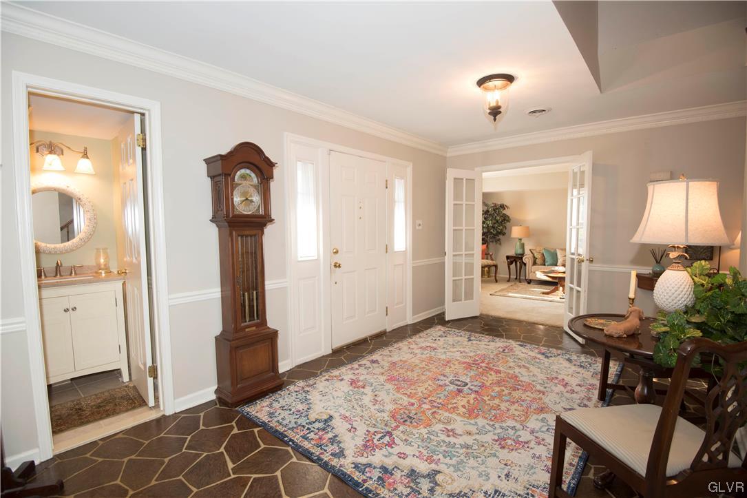HUGE FOYER IS 19 FEET WIDE... CONVENIENTLY LOCATED