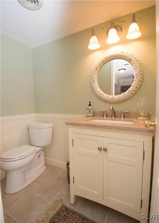 FIRST FLOOR POWDER WITH CHAIR RAIL & BEADBOARD WAL