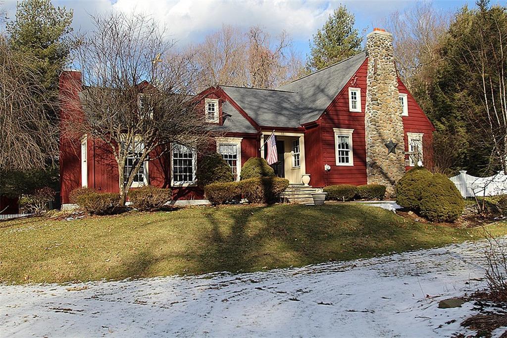 53 Ansonia Road Woodbridge, CT 06525 - Photo 1 of 1 front view of a house with a yard