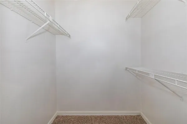 a view of small space with racks on the wall