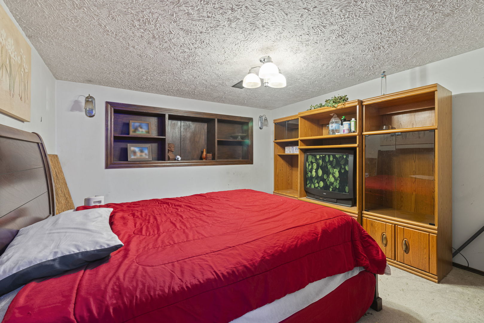 391 Cornell Lane Elgin, IL 60123 - Photo 19 of 20 a bedroom with a large bed and a dresser
