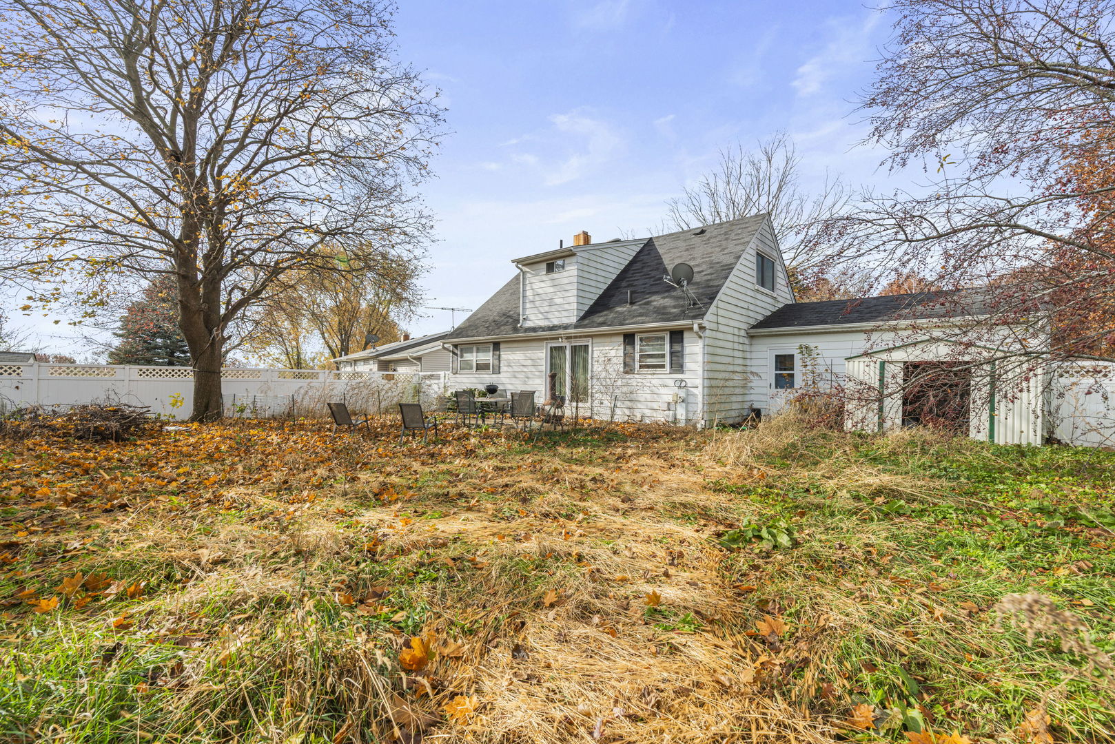391 Cornell Lane Elgin, IL 60123 - Photo 20 of 20 a front view of a house with a yard