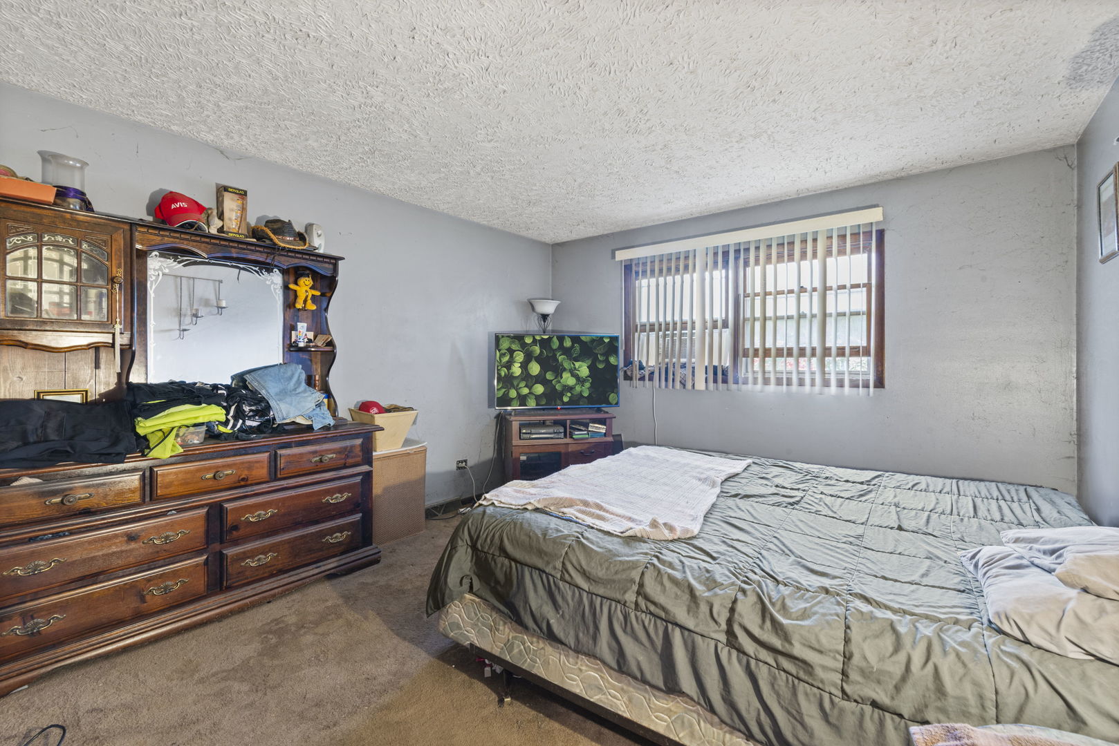 391 Cornell Lane Elgin, IL 60123 - Photo 9 of 20 a bedroom with a bed and a window