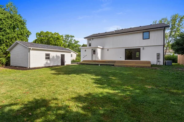 a house view with a garden space
