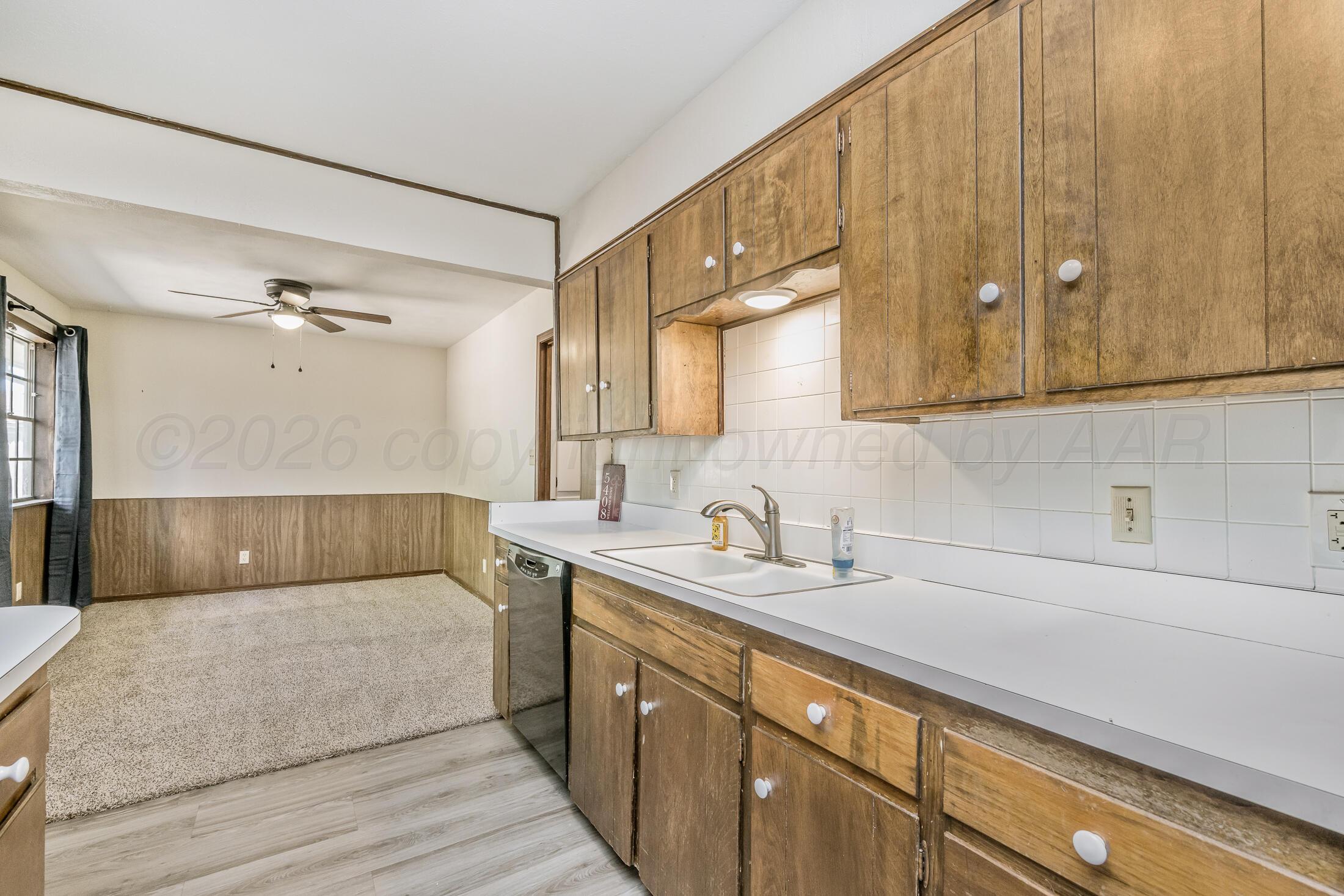 5408 George Terrace Amarillo, TX 79106 - Photo 12 of 26 a bathroom with a sink and a mirror