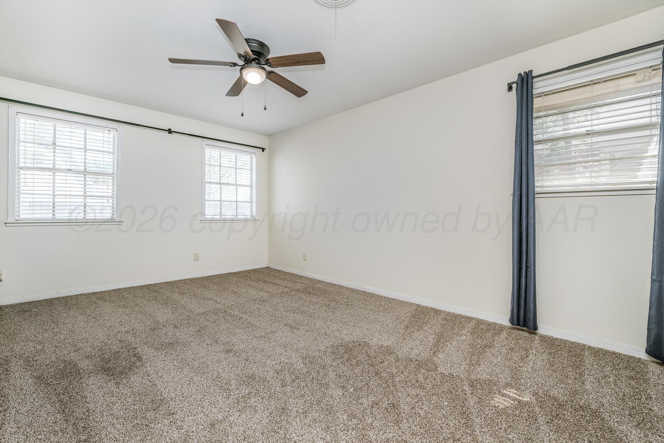 5408 George Terrace Amarillo, TX 79106 - Photo 14 of 26 a view of an empty room with a window