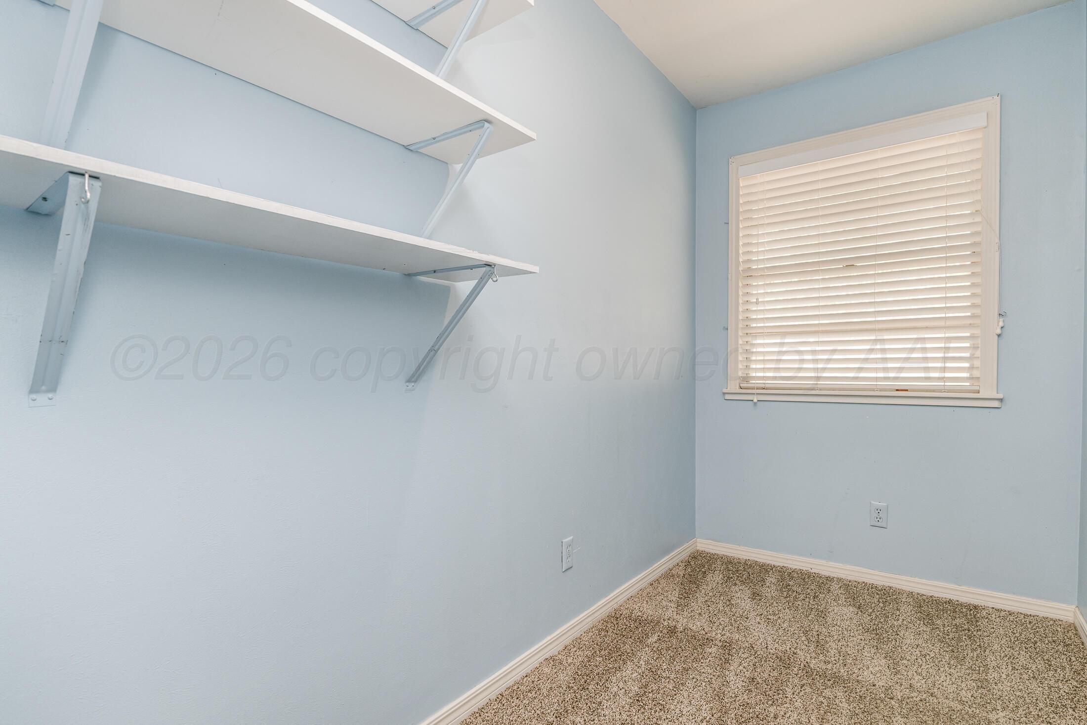 5408 George Terrace Amarillo, TX 79106 - Photo 16 of 26 a view of a room that has a window in it