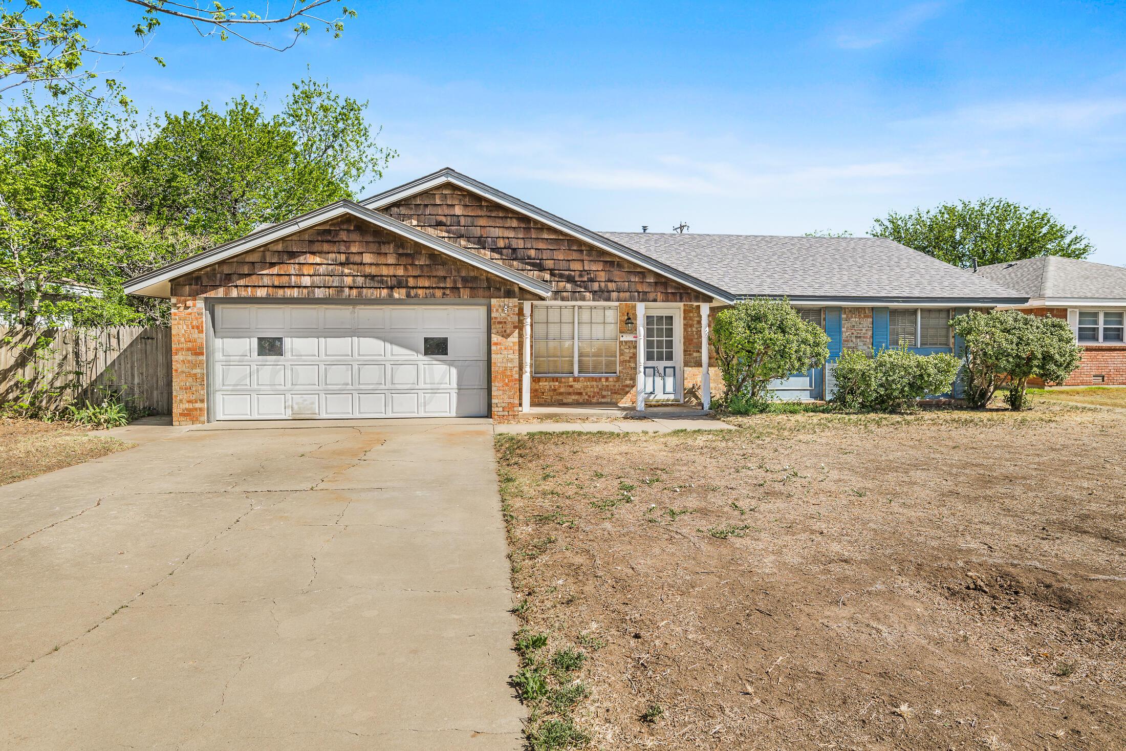 5408 George Terrace Amarillo, TX 79106 - Photo 3 of 26 front view of a house with a yard