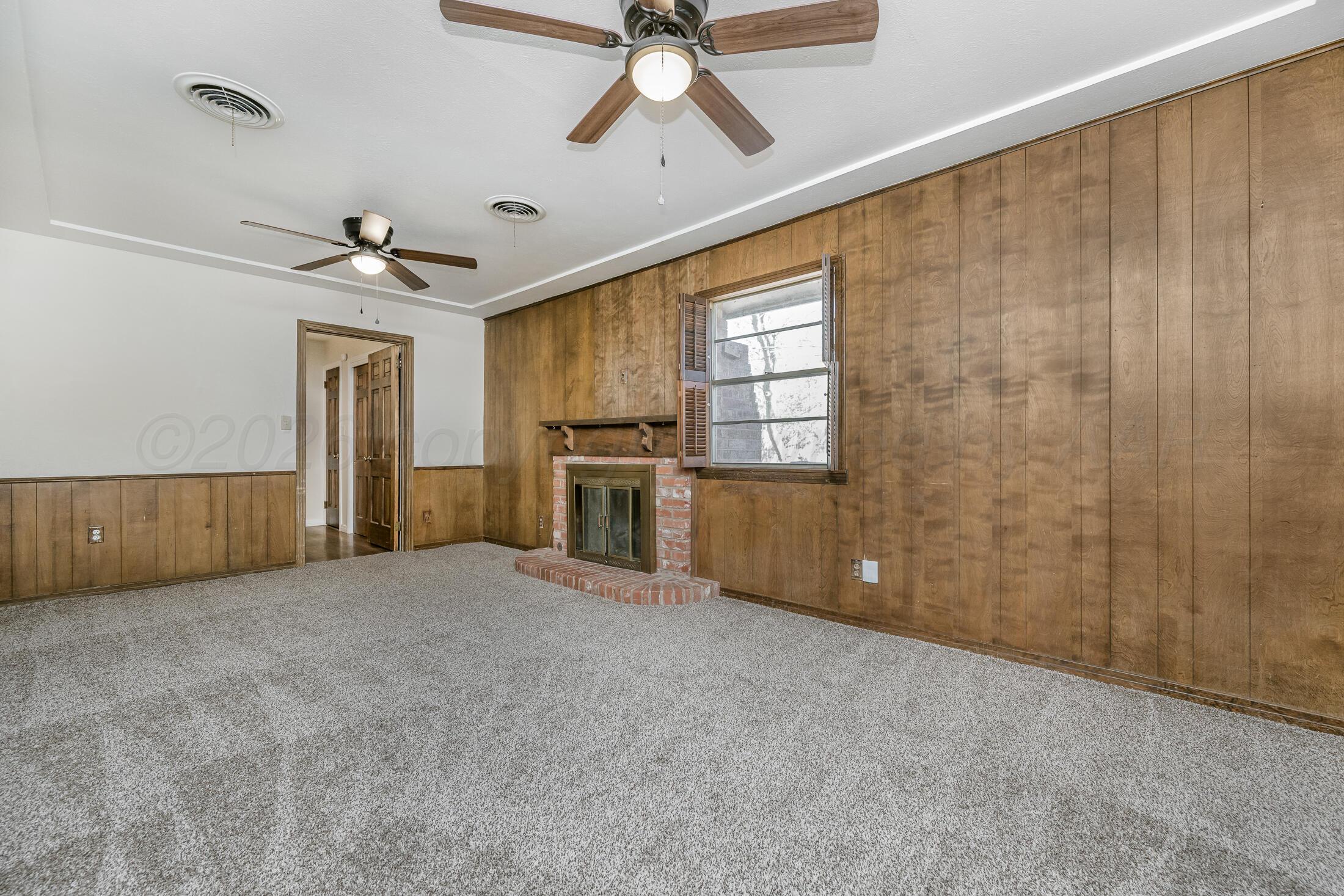 5408 George Terrace Amarillo, TX 79106 - Photo 7 of 26 a view of an empty room with a window
