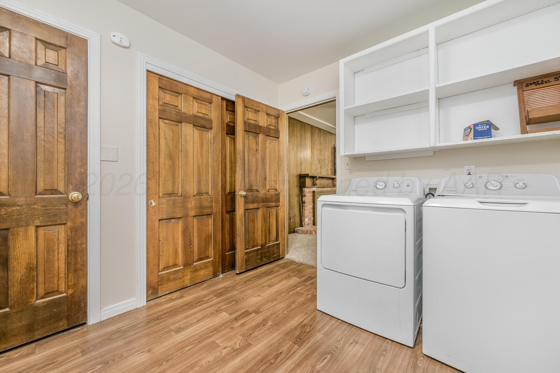 5408 George Terrace Amarillo, TX 79106 - Photo 9 of 26 a view of a storage & utility room with wooden floor