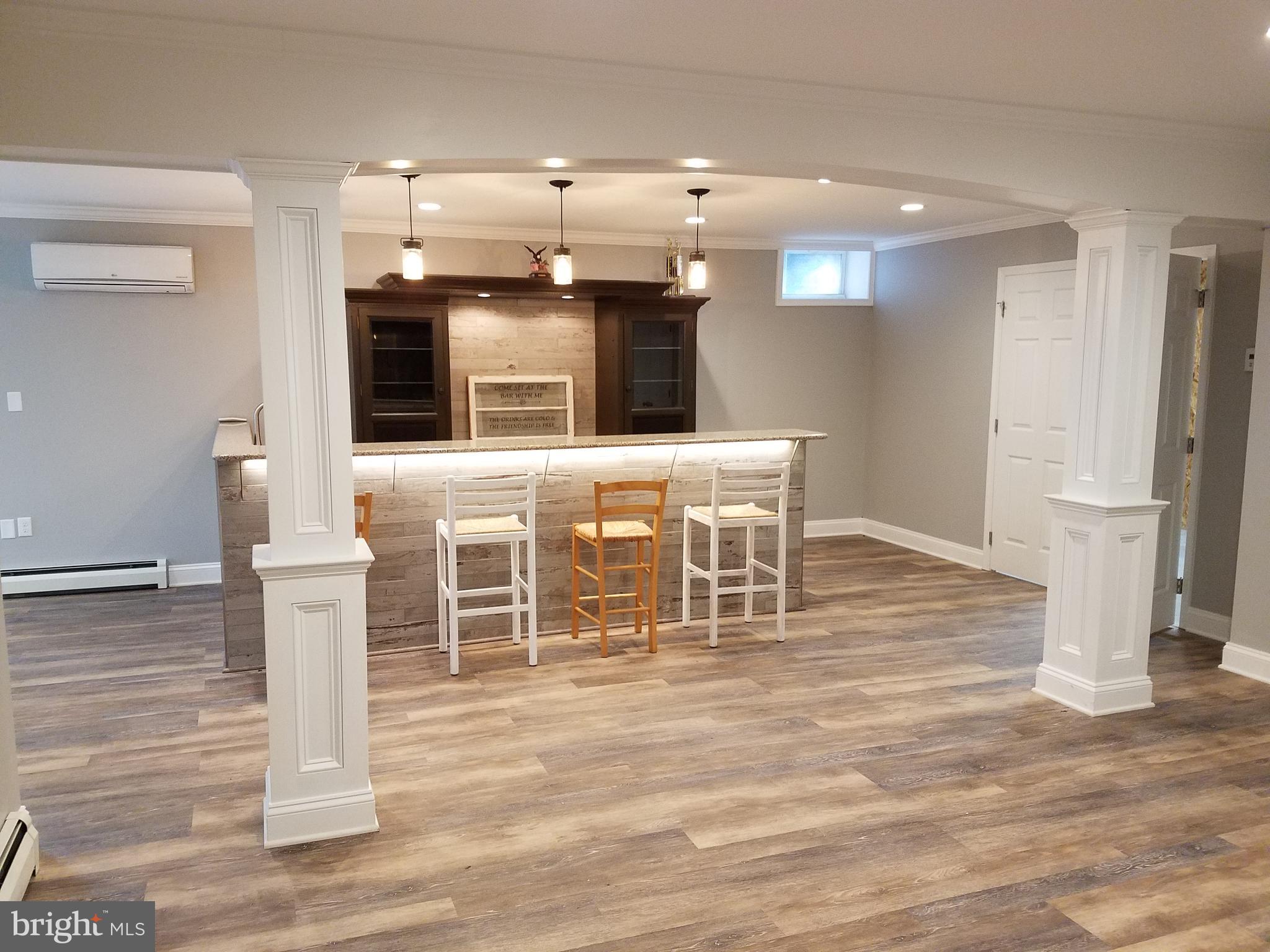 2920 Duncan Road White Hall, MD 21161 - Photo 31 of 40 Lower Level Granite Top Bar w/ Custom Cabinets