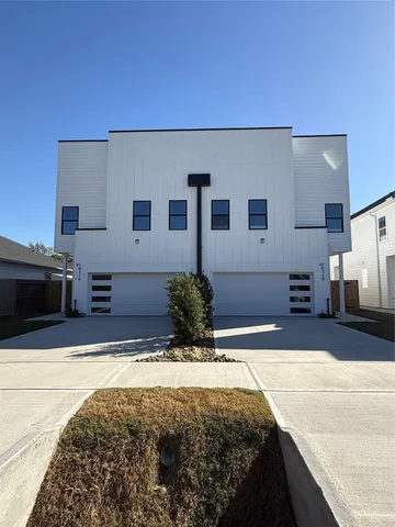 a bedroom with a bed and a fireplace