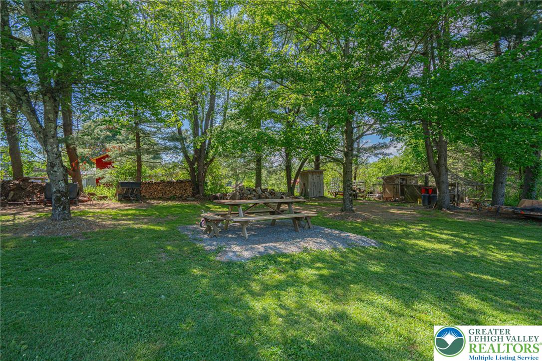 341 Lower Greenhill Road Kunkletown, PA 18058 - Photo 66 of 69 A private, shaded yard offers a picnic area and space for outdoor activities.