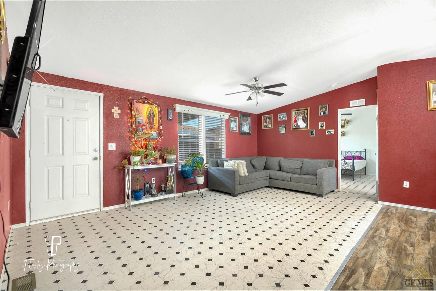 Undisclosed Address Bakersfield, CA 93308 - Photo 8 of 32 a bedroom with a large bed and a window