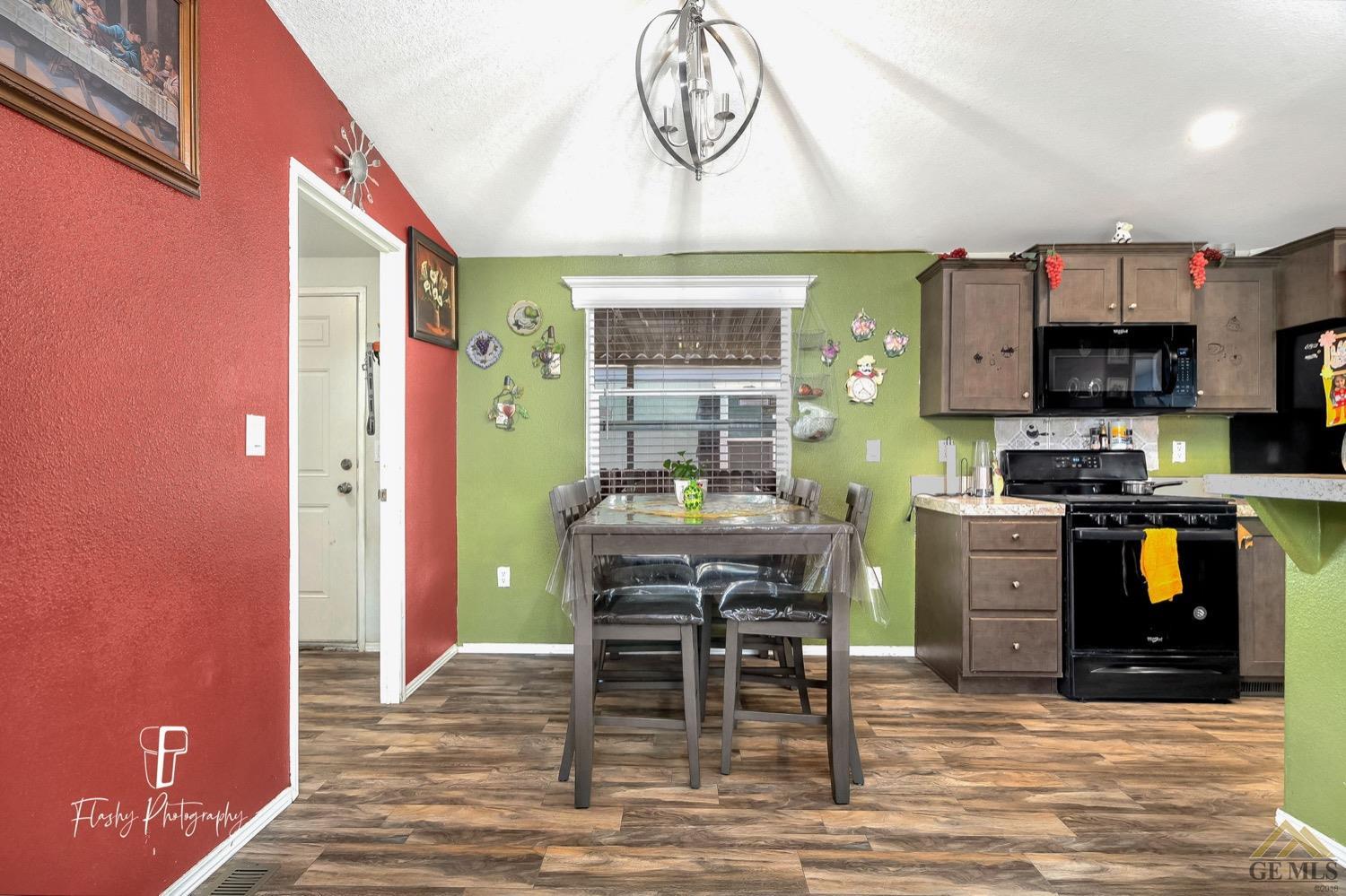 Undisclosed Address Bakersfield, CA 93308 - Photo 10 of 32 a kitchen with stainless steel appliances granite countertop a stove and a refrigerator