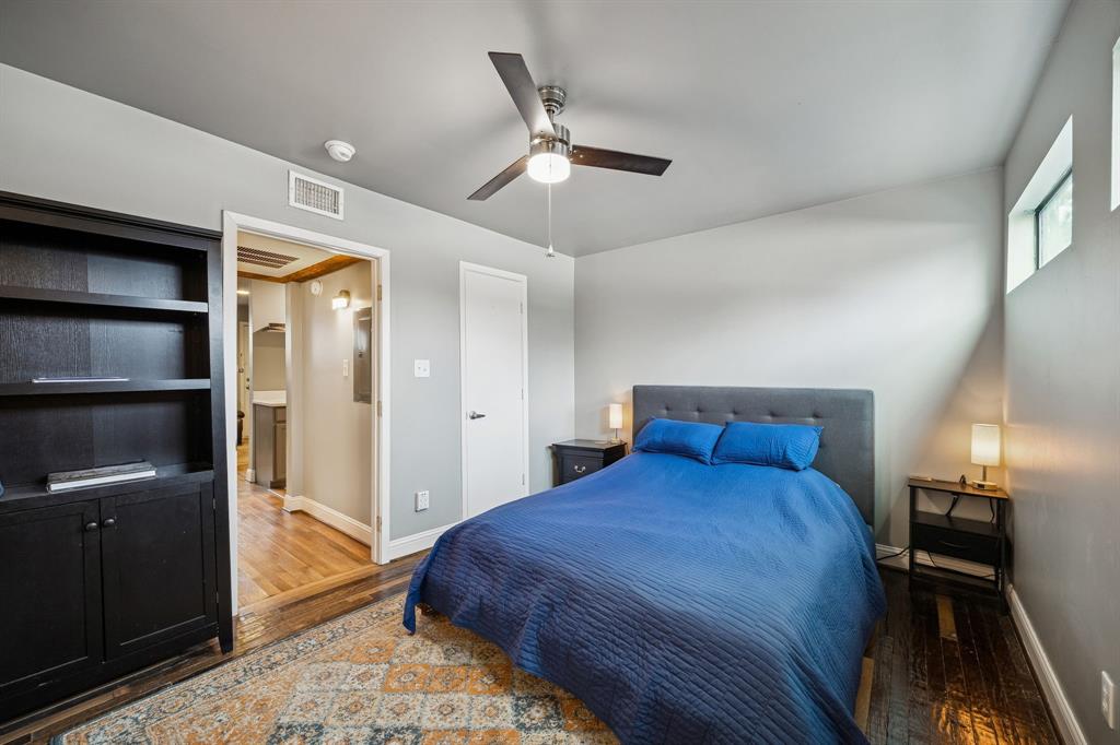 1804 Gould Street, Unit 3 Dallas, TX 75215 - Photo 19 of 19 a bedroom with a bed and a walk in closet