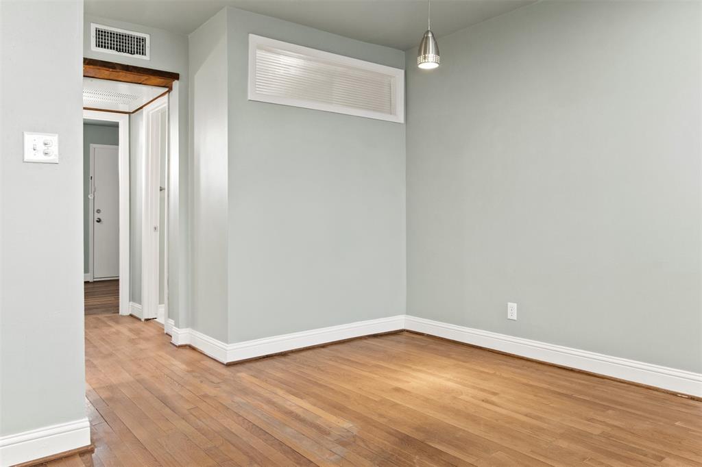 1804 Gould Street, Unit 3 Dallas, TX 75215 - Photo 5 of 19 wooden floor in an empty room