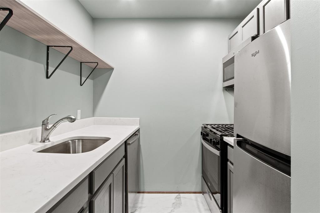 1804 Gould Street, Unit 3 Dallas, TX 75215 - Photo 7 of 19 a utility room with dryer and washer