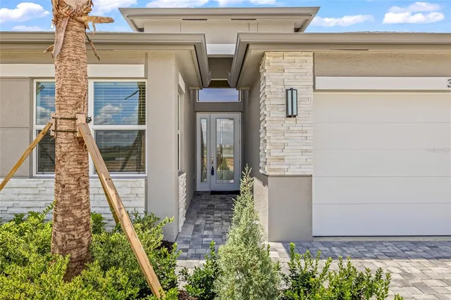 a front view of a house with stairs