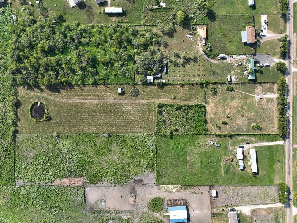 6594 County Road 140 Kaufman, TX 75142 - Photo 12 of 15 an aerial view of a houses with yard