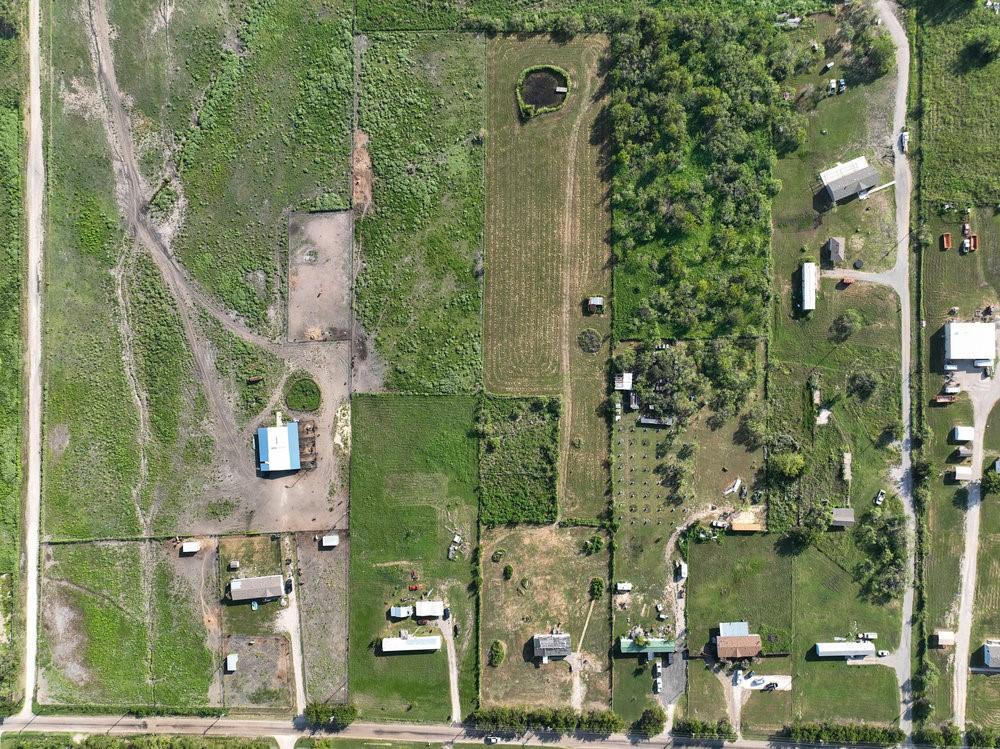 6594 County Road 140 Kaufman, TX 75142 - Photo 9 of 15 an aerial view of waterside residential houses