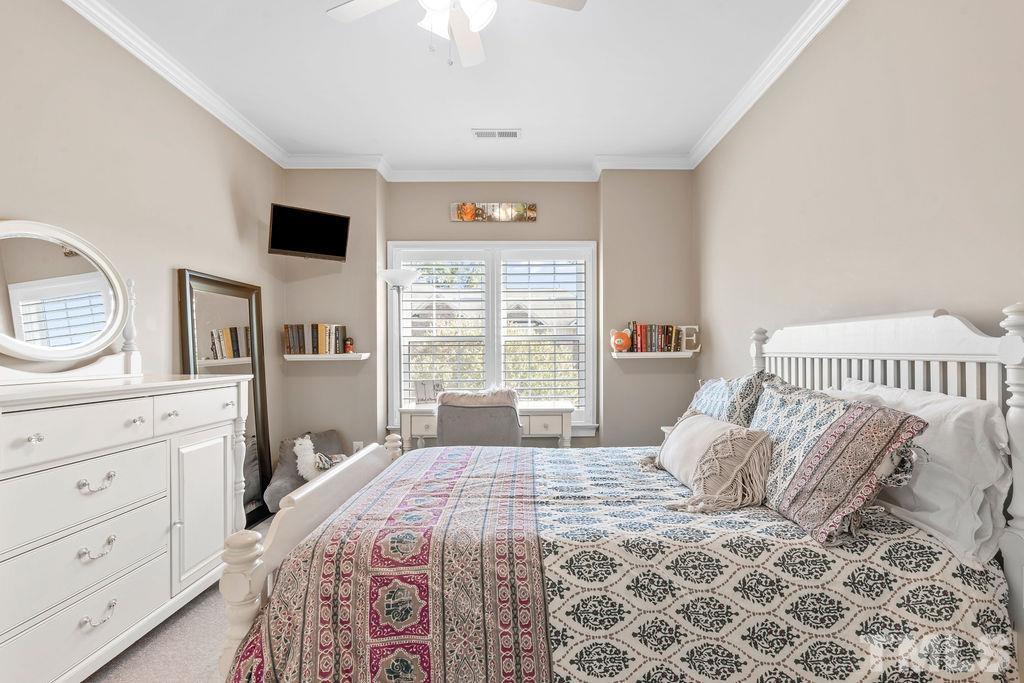 1303 Cameron View Court Raleigh, NC 27608 - Photo 15 of 30 a bedroom with a large bed and a window