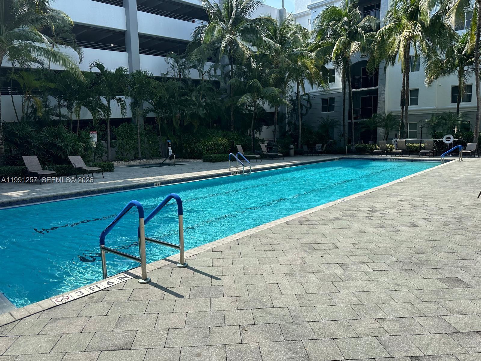 1660 Renaissance Commons Boulevard, Unit 2606 Boynton Beach, FL 33426 - Photo 25 of 26 a view of backyard with green space