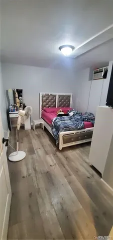 a bedroom with furniture and a couch