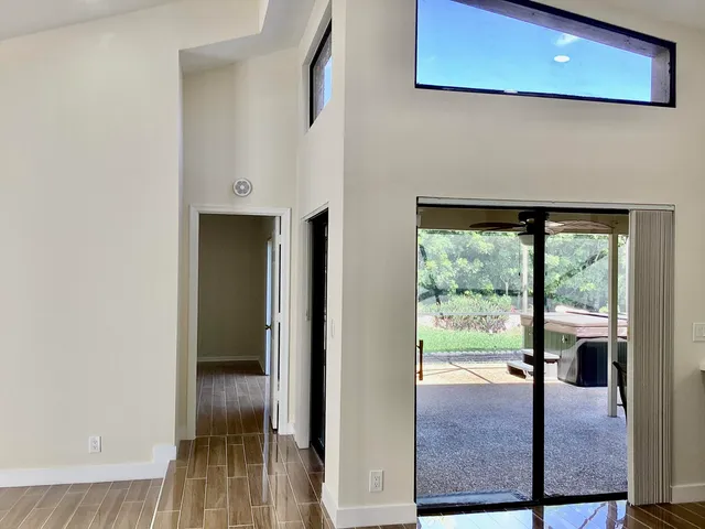 a view of a living room with a balcony