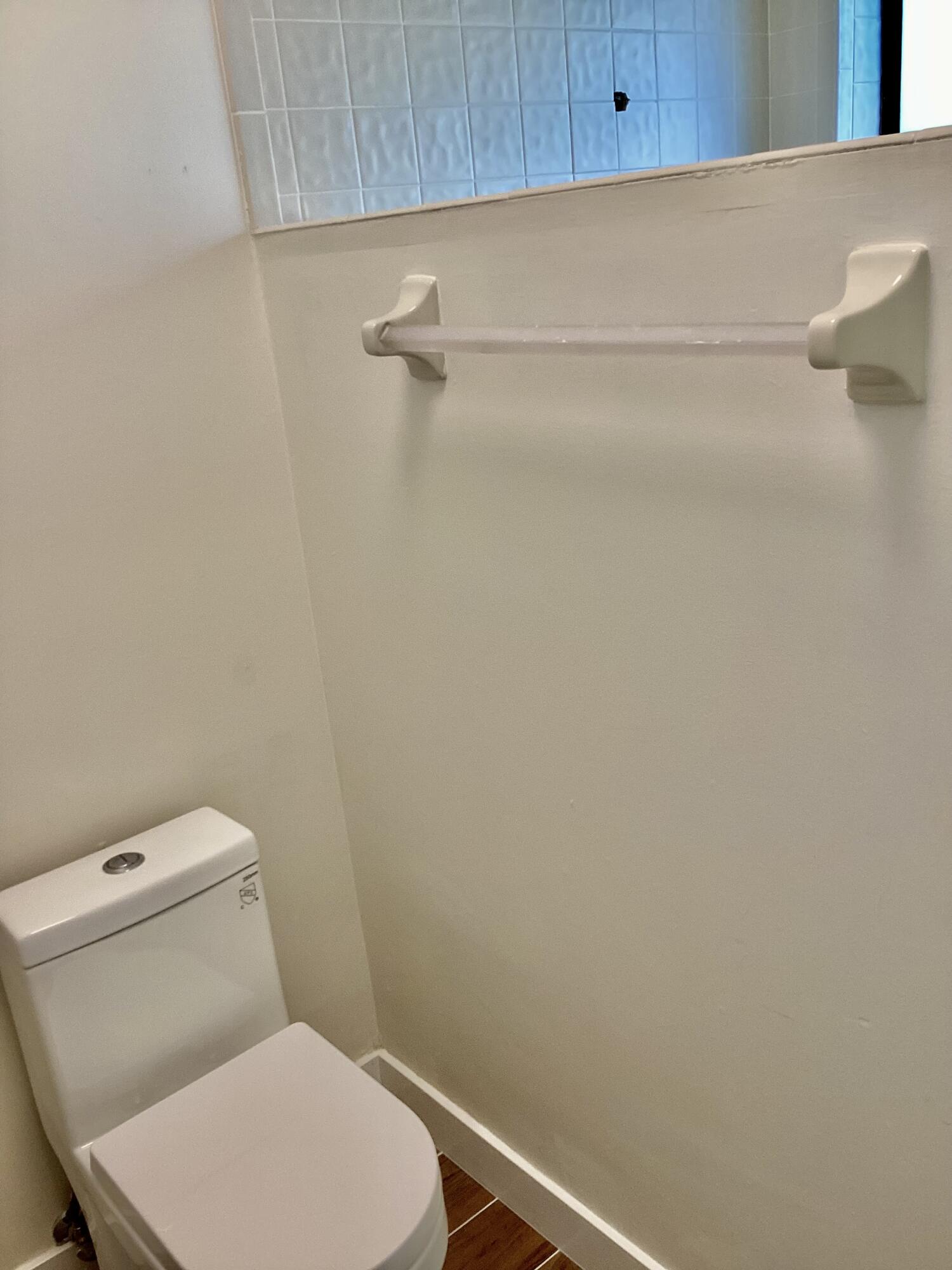 8895 Old Pine Road, Unit 4 Boca Raton, FL 33433 - Photo 21 of 46 a white toilet sitting next to a white wall