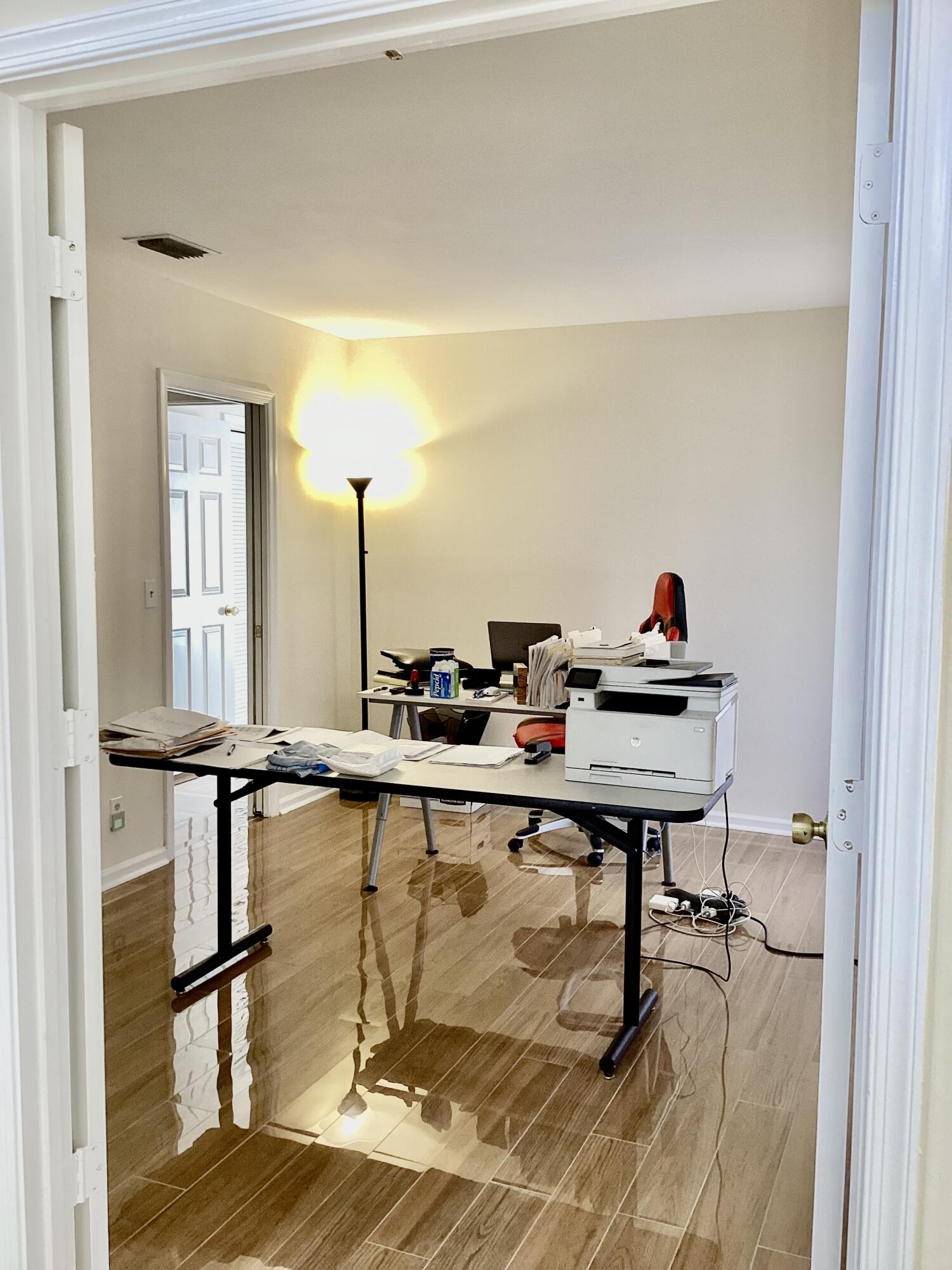 8895 Old Pine Road, Unit 4 Boca Raton, FL 33433 - Photo 27 of 46 a room with table chairs and wooden floor