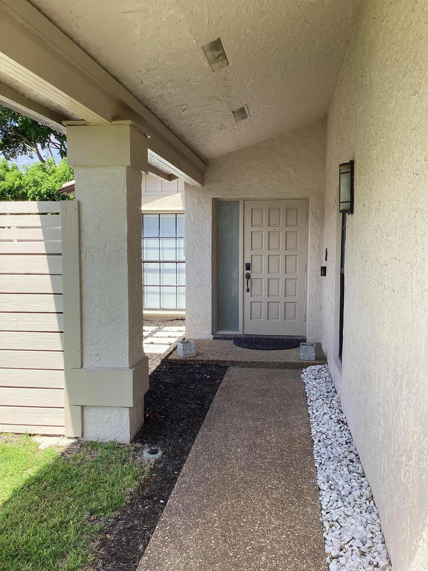 8895 Old Pine Road, Unit 4 Boca Raton, FL 33433 - Photo 3 of 46 a view of an entryway of a house