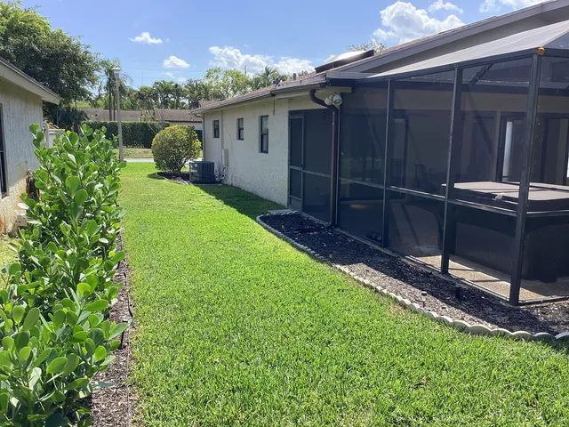 a view of a backyard space