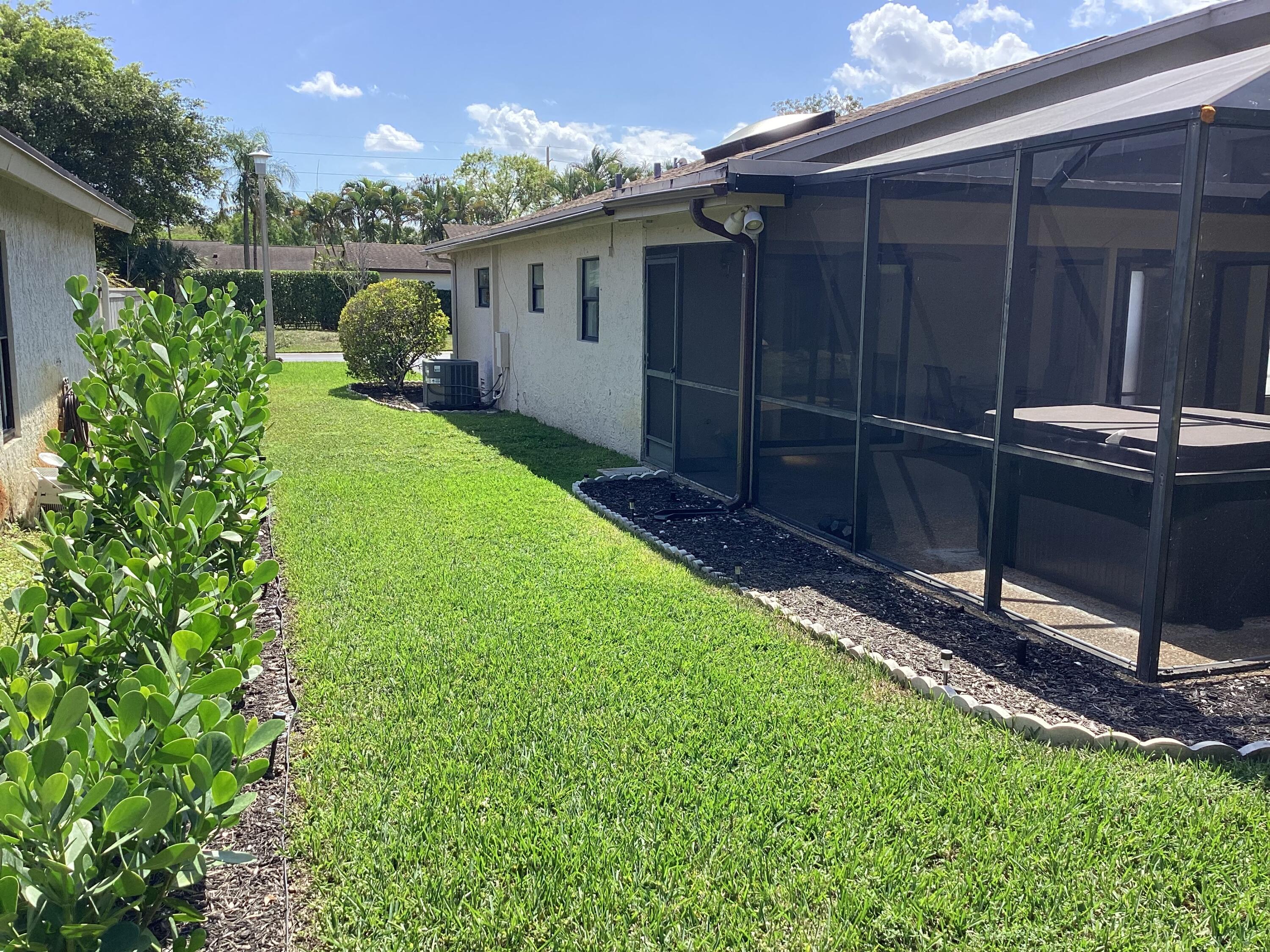 8895 Old Pine Road, Unit 4 Boca Raton, FL 33433 - Photo 35 of 46 a view of a backyard space