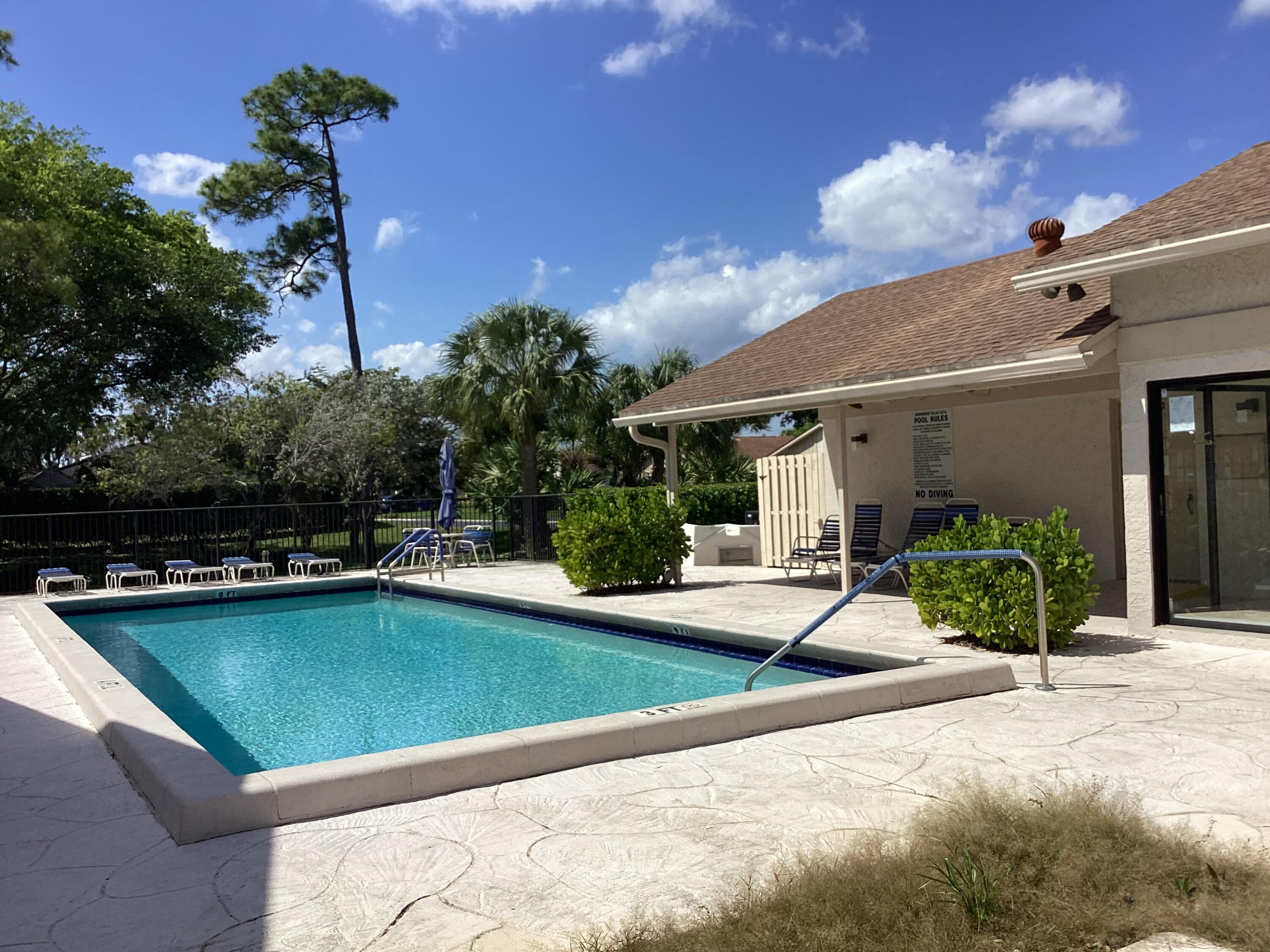 8895 Old Pine Road, Unit 4 Boca Raton, FL 33433 - Photo 38 of 46 a view of a house with swimming pool and sitting area