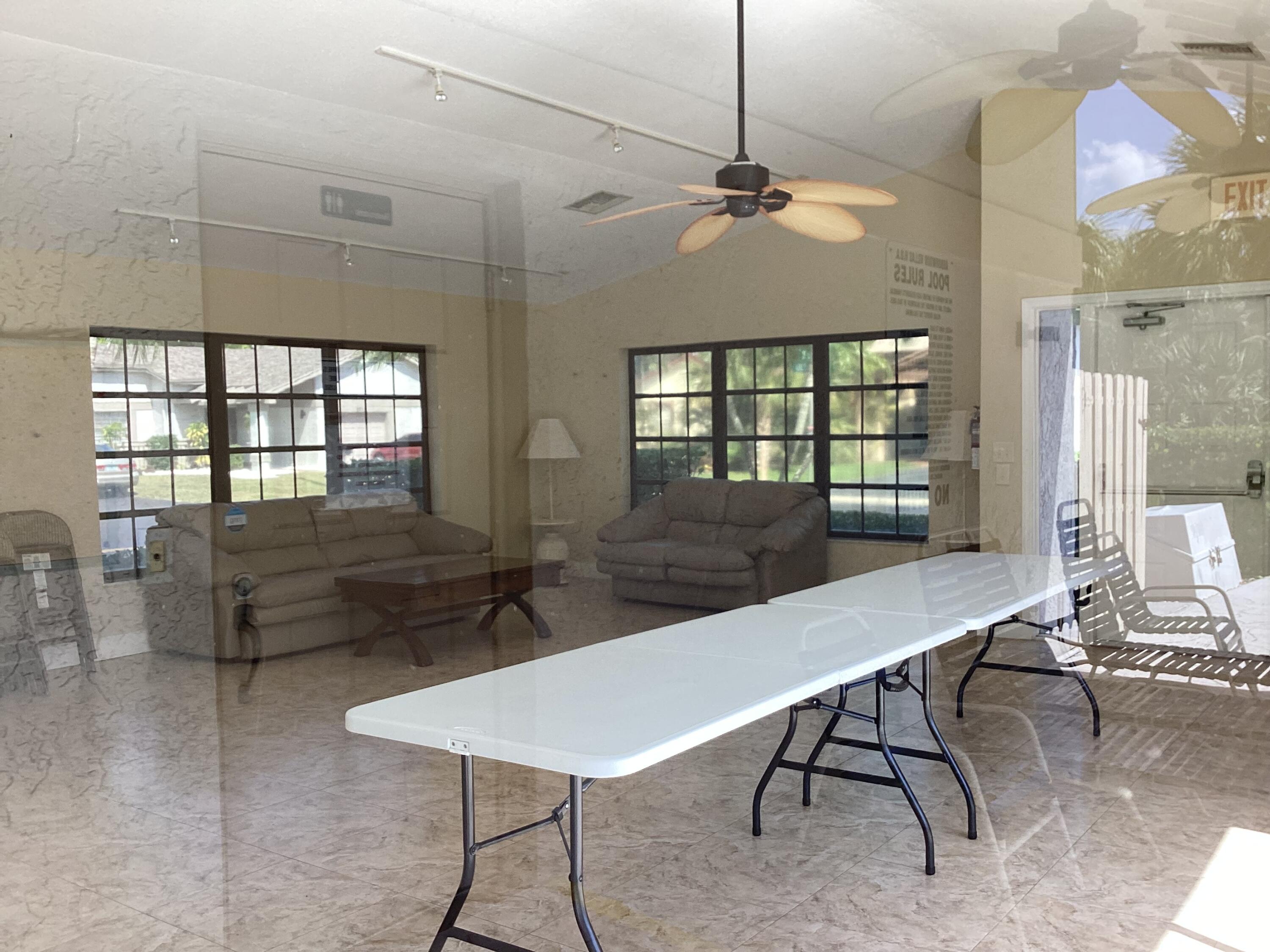 8895 Old Pine Road, Unit 4 Boca Raton, FL 33433 - Photo 40 of 46 a view of a dining room with furniture