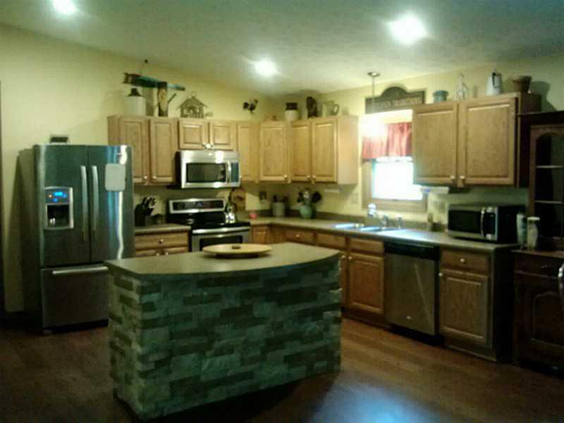 1262 Hartzell Road New Castle, PA 16105 - Photo 5 of 21 Cafeteria/Kitchen. Open spacious kitchen, oak cabinets, stainless appliances, and a large island, for prepping .