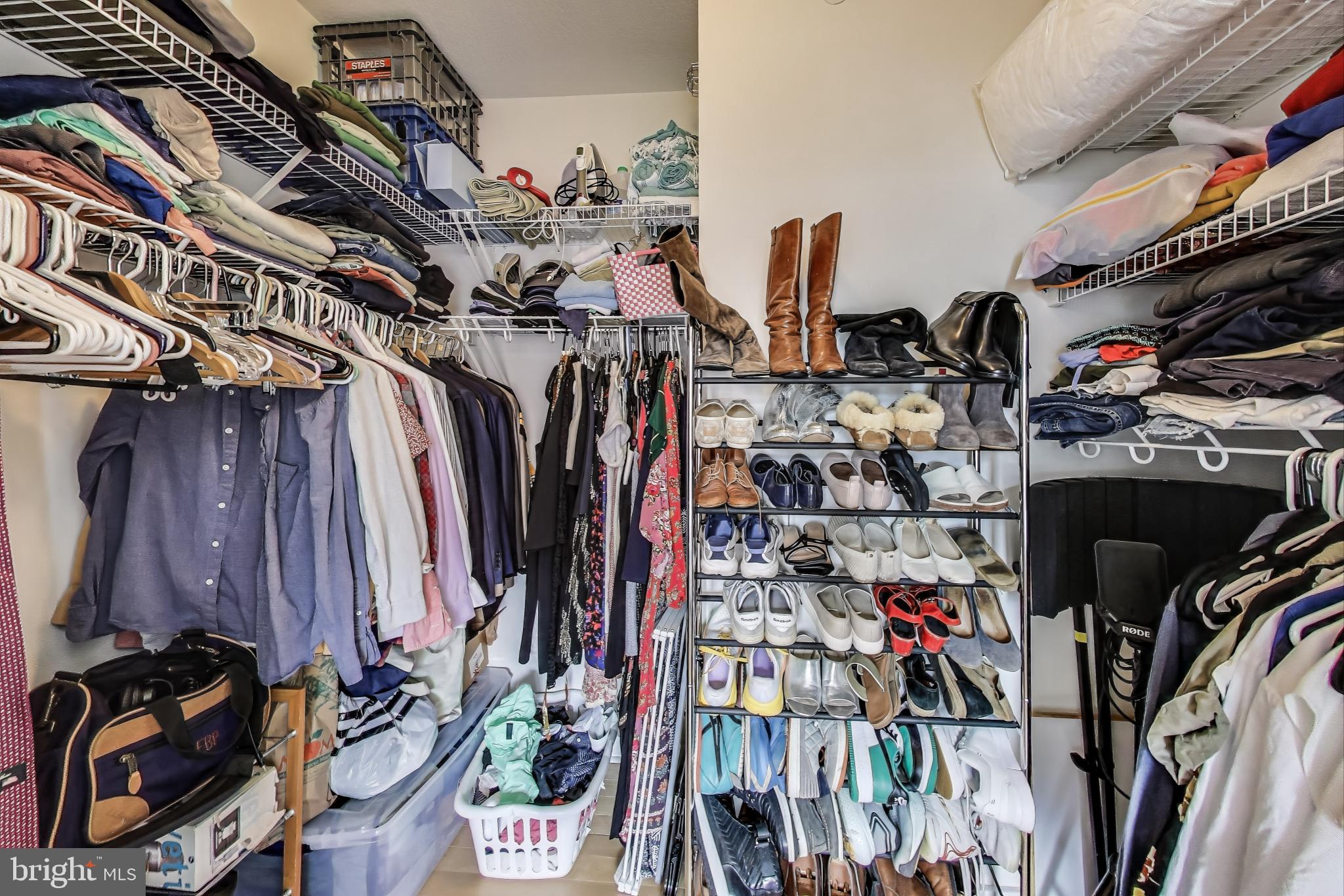 475 K Street Northwest, Unit 919 Washington, DC 20001 - Photo 16 of 43 a view of walk in closet with clothes