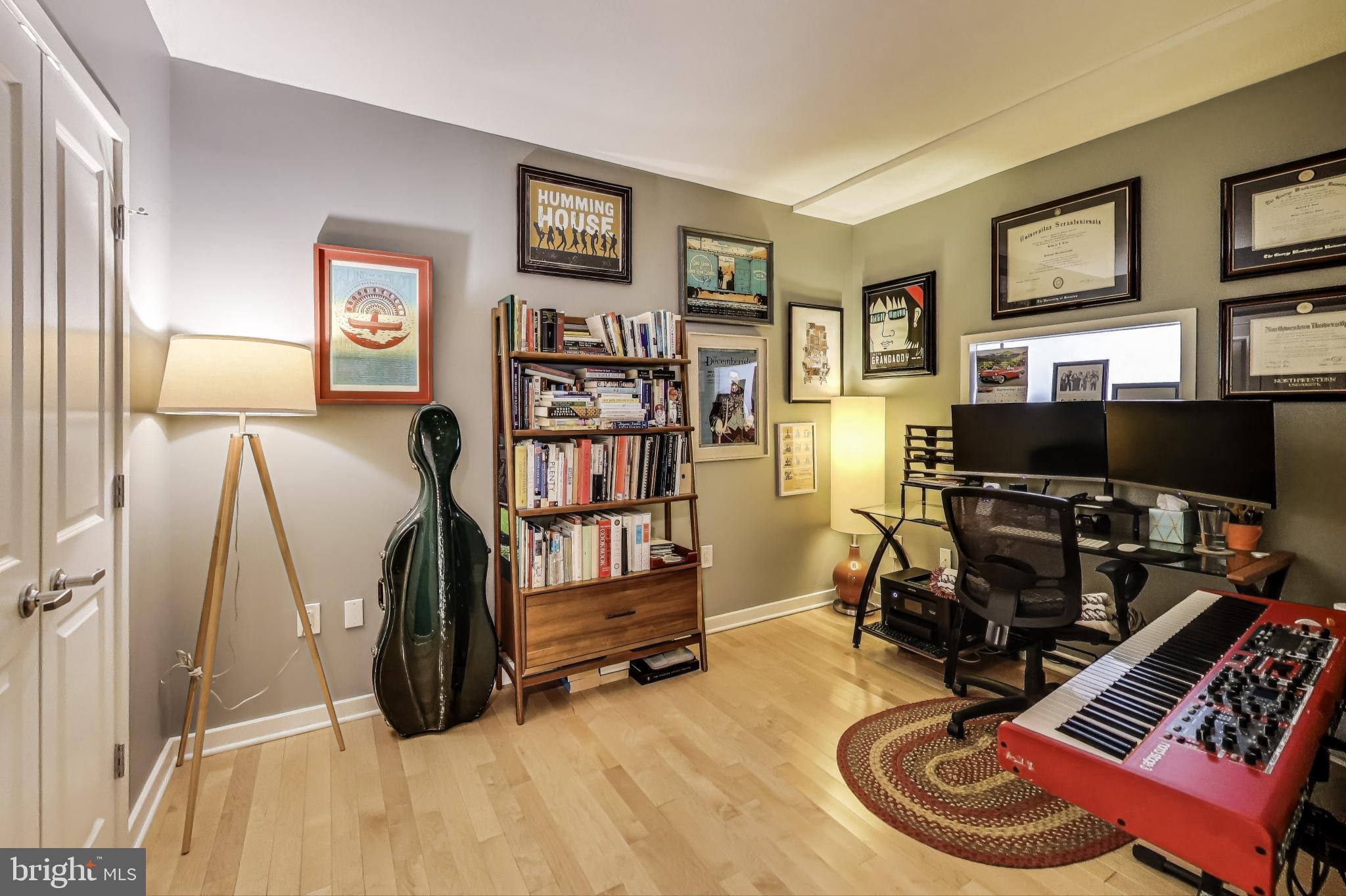 475 K Street Northwest, Unit 919 Washington, DC 20001 - Photo 17 of 43 a room with furniture and a flat screen tv