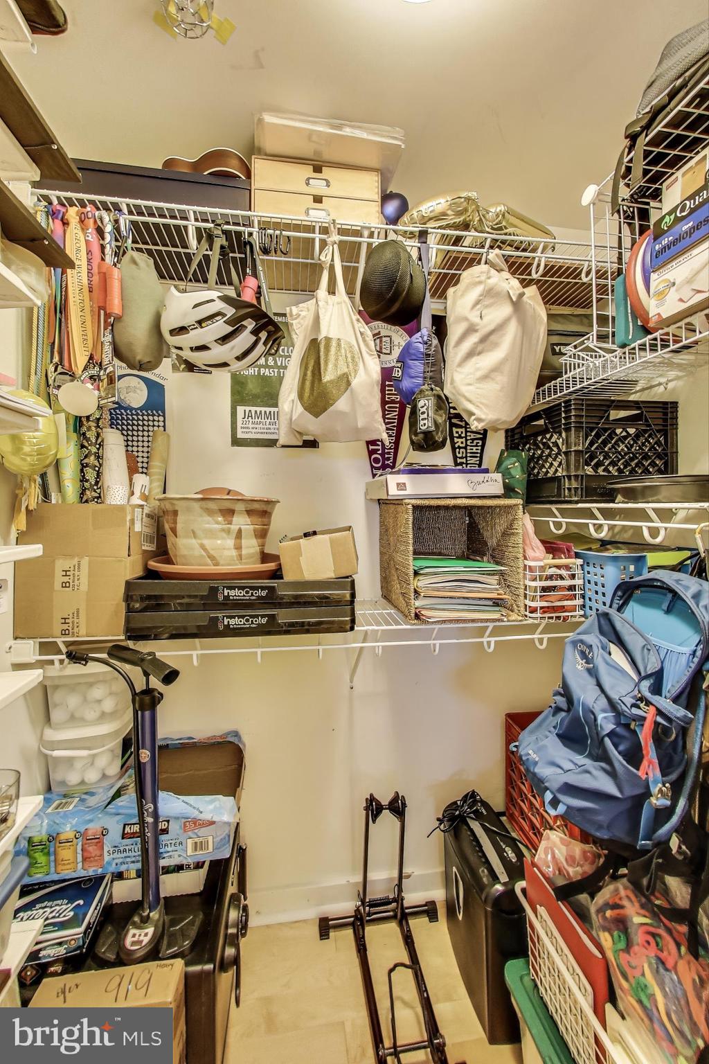 475 K Street Northwest, Unit 919 Washington, DC 20001 - Photo 19 of 43 a kitchen with a stove and a wooden floor