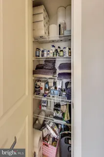 a kitchen with a lot of cabinets and a stove