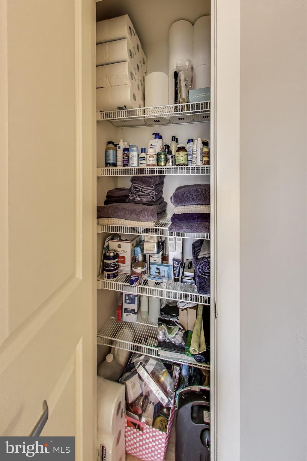475 K Street Northwest, Unit 919 Washington, DC 20001 - Photo 23 of 43 a kitchen with a lot of cabinets and a stove