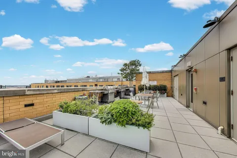a view of a terrace with furniture