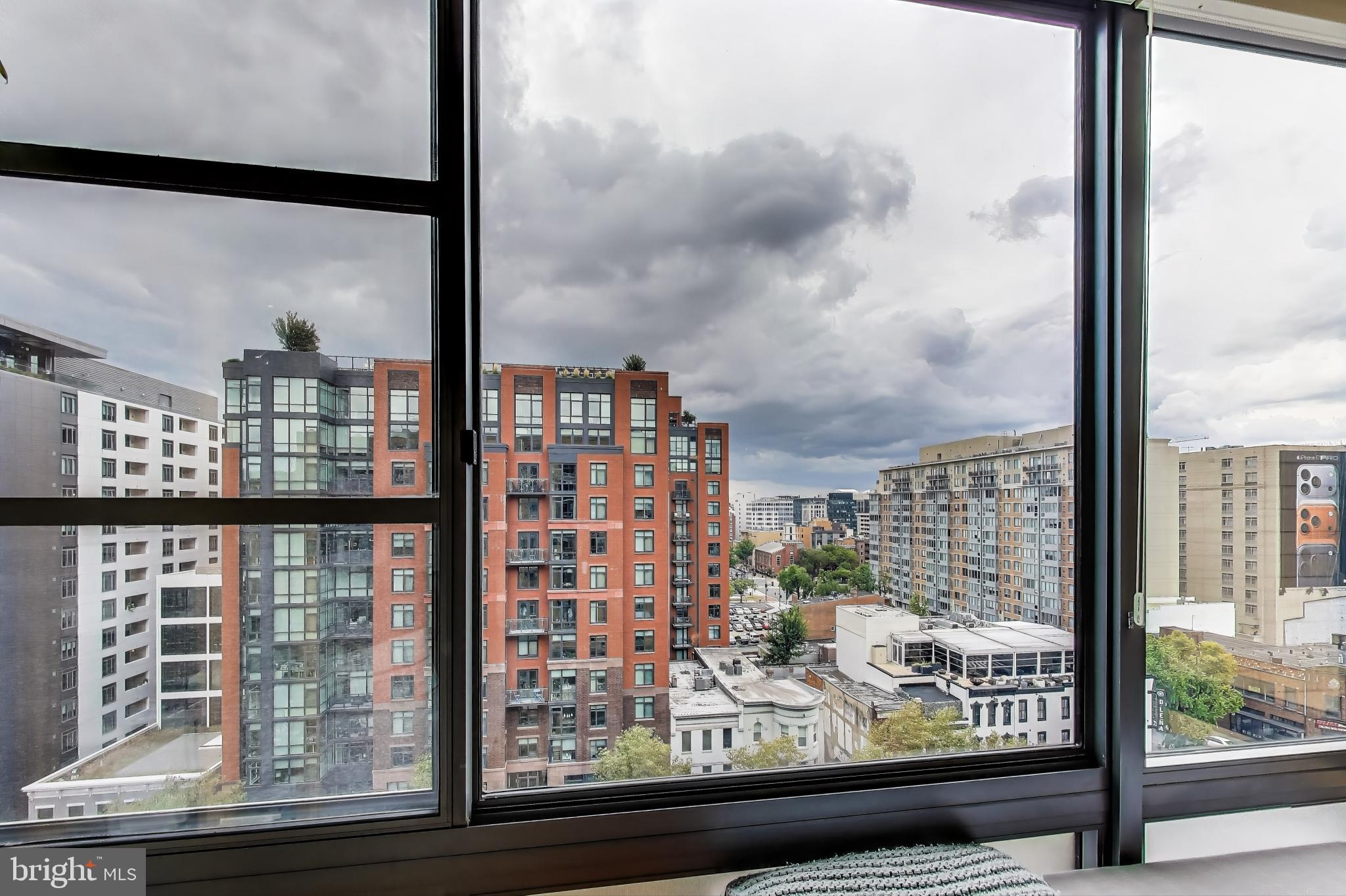 475 K Street Northwest, Unit 919 Washington, DC 20001 - Photo 7 of 43 a view of a glass building from a window