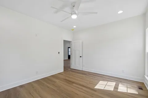 a view of an empty walk in closet