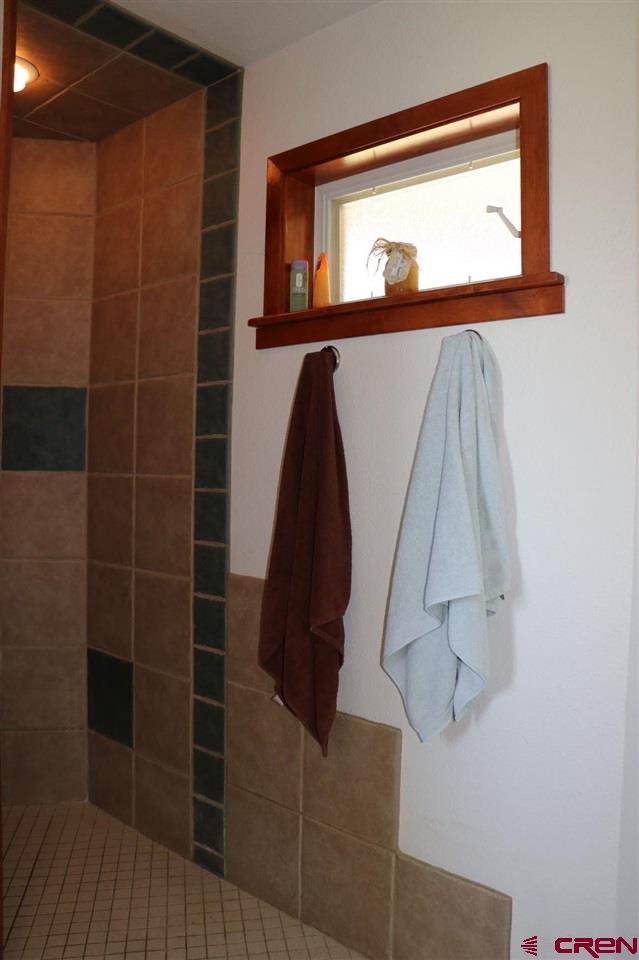 23720 County Rd M Cortez, CO 81321 - Photo 21 of 34 a close view of a bathtub in a bathroom