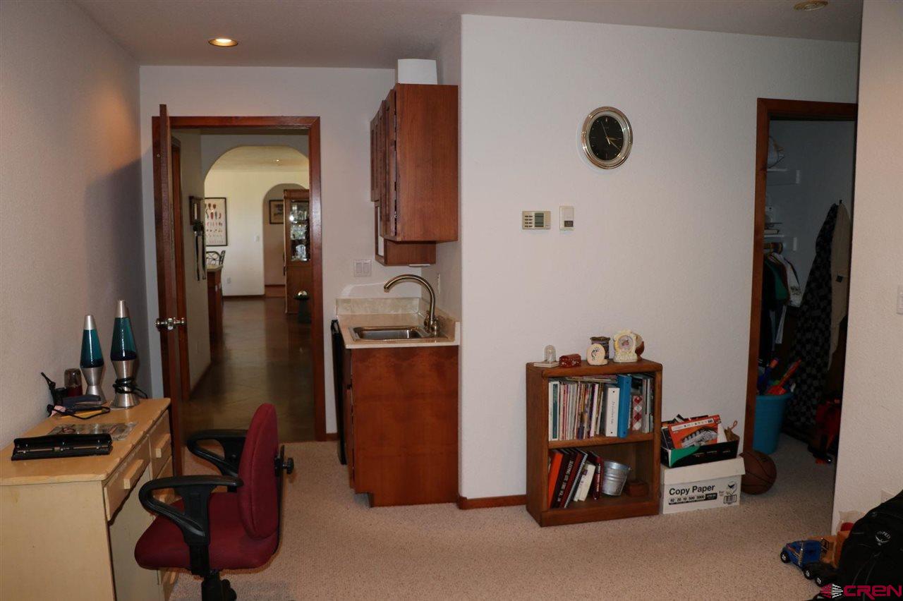 23720 County Rd M Cortez, CO 81321 - Photo 31 of 34 a room with gym equipment