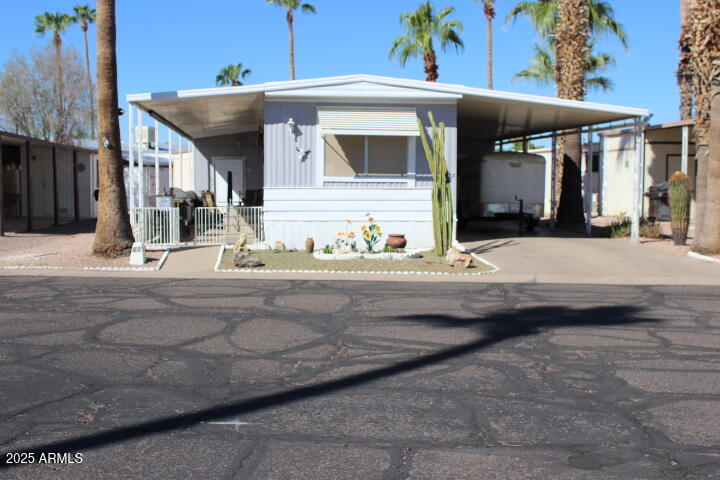 11425 East University Drive, Unit 63 Apache Junction, AZ 85120 - Photo 1 of 30 a view of a house with a street