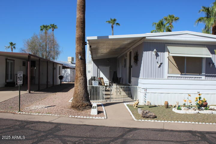 11425 East University Drive, Unit 63 Apache Junction, AZ 85120 - Photo 21 of 30 a view of the house front of a house